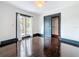 Bedroom featuring hardwood floors and sliding closet doors at 4827 7Th N Ave, St Petersburg, FL 33713