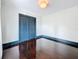 Bedroom featuring hardwood floors and sliding closet doors at 4827 7Th N Ave, St Petersburg, FL 33713