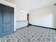 Open bonus room featuring decorative tile flooring and modern lighting at 4827 7Th N Ave, St Petersburg, FL 33713