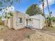 A view of the exterior of the home including access to the rear entry at 4827 7Th N Ave, St Petersburg, FL 33713