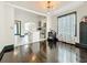 Hardwood floors complement the open floor plan connecting the living room to the kitchen at 4827 7Th N Ave, St Petersburg, FL 33713
