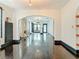 Elegant living room with hardwood floors, archways, and access to the front entry at 4827 7Th N Ave, St Petersburg, FL 33713