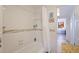 Bright bathroom featuring a tiled shower and bathtub, along with neutral wall colors at 6800 Sunset Way # 1003, St Pete Beach, FL 33706