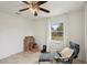Bedroom with lots of cardboard boxes, natural light, and ceiling fan at 829 E 4Th St, Englewood, FL 34223