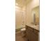 Bright bathroom with tub/shower combo and granite vanity at 8438 Wheat Stone Dr, Zephyrhills, FL 33540