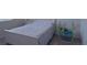 Cozy bedroom with twin bed and neutral decor at 8438 Wheat Stone Dr, Zephyrhills, FL 33540