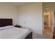 Comfortable bedroom with large closet and ensuite bathroom access at 8438 Wheat Stone Dr, Zephyrhills, FL 33540
