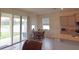 Cozy dining area with sliding doors leading to outdoor patio at 8438 Wheat Stone Dr, Zephyrhills, FL 33540