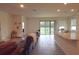 Open living space with views of the backyard, seamlessly blending indoor and outdoor living at 8438 Wheat Stone Dr, Zephyrhills, FL 33540