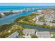Breathtaking aerial view of waterfront community with ocean access and beautiful landscaping at 9770 Indian Key Trl # 102, Seminole, FL 33776