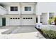 Well-kept townhome featuring garage parking and tidy landscaping at 9770 Indian Key Trl # 102, Seminole, FL 33776
