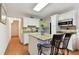 Eat-in kitchen has granite countertops, stainless appliances, and ample cabinet space at 9770 Indian Key Trl # 102, Seminole, FL 33776