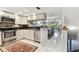 Open kitchen featuring stainless steel appliances and ample counter space at 9770 Indian Key Trl # 102, Seminole, FL 33776