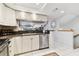 Bright kitchen with stainless appliances and open layout at 9770 Indian Key Trl # 102, Seminole, FL 33776