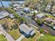 Aerial view of a home with canal access, including a boat dock at 106 W North Branch Rd, Ruskin, FL 33570