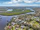 Aerial view of the community, featuring waterways and homes at 106 W North Branch Rd, Ruskin, FL 33570