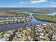 Stunning overhead view of a neighborhood with access to waterways at 106 W North Branch Rd, Ruskin, FL 33570