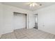 Bedroom featuring tiled floors, closet, and white walls at 106 W North Branch Rd, Ruskin, FL 33570