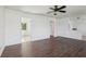 Spacious living room with tiled floors and neutral walls, creating a bright and welcoming space at 106 W North Branch Rd, Ruskin, FL 33570