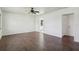 Open living room with tiled floors and neutral walls, creating a bright and welcoming space at 106 W North Branch Rd, Ruskin, FL 33570