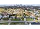 Aerial view of a residential property featuring a charming single-story home and lush green lawns at 119 Chesapeake Ave, Tampa, FL 33606