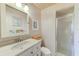 A simple bathroom featuring a sink, toilet, and walk-in shower at 13250 Ridge Rd # 10-4, Largo, FL 33778