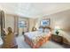 A well-decorated bedroom with a comfortable bed and ample natural light at 13250 Ridge Rd # 10-4, Largo, FL 33778