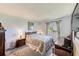 A charming bedroom with a cozy bed and classic furniture at 13250 Ridge Rd # 10-4, Largo, FL 33778