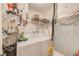 A functional laundry area with a washer, dryer, shelving, and organized tools at 13250 Ridge Rd # 10-4, Largo, FL 33778