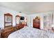 Well-lit main bedroom with ensuite bathroom access at 13250 Ridge Rd # 10-4, Largo, FL 33778