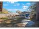 Showing the Large backyard, patio, shed, and playhouse at 15530 Morgan St, Clearwater, FL 33760