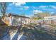 Backyard showing the shed, firepit, and some chairs at 15530 Morgan St, Clearwater, FL 33760