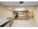 The kitchen offers an eat-in area and stainless steel appliances at 15530 Morgan St, Clearwater, FL 33760