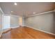 Spacious living area with wood floors and recessed lighting at 15530 Morgan St, Clearwater, FL 33760