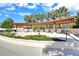 Stunning patio area with lounge chairs and a pergola, perfect for relaxing and enjoying the beautiful view at 15708 Oakleaf Run Dr, Lithia, FL 33547