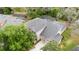 Expansive aerial view showcasing the beautiful home, lush landscaping and the surrounding neighborhood at 15912 Ternglade Dr, Lithia, FL 33547