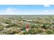 Aerial view showcasing the neighborhood and surrounding natural landscape at 15912 Ternglade Dr, Lithia, FL 33547