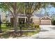 Charming two-story home featuring stone accents, manicured landscaping and a three car garage at 15912 Ternglade Dr, Lithia, FL 33547