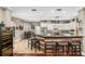 Spacious kitchen with a bar, seating, modern appliances, and plenty of counter space for easy meal preparation at 15912 Ternglade Dr, Lithia, FL 33547
