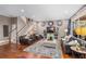 Inviting living room with a view of the backyard, plush seating, and stylish decor for relaxation and entertainment at 15912 Ternglade Dr, Lithia, FL 33547