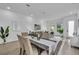 Open dining room featuring an expansive layout with natural light and elegant furniture at 1627 9Th N Ave, St Petersburg, FL 33713