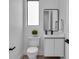 Stylish powder room with modern fixtures and a minimalist design aesthetic at 1627 9Th N Ave, St Petersburg, FL 33713