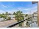 Balcony view of palm trees and the street at 1627 9Th N Ave, St Petersburg, FL 33713