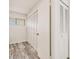 Bright bedroom with hardwood floors, a window, and ample closet space offers a cozy atmosphere at 1844 Bough Ave # C, Clearwater, FL 33760