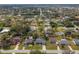 Aerial view of a residential neighborhood showcasing tree-lined streets and well-maintained homes, highlighting community charm at 20191 Rutherford Ave, Port Charlotte, FL 33952