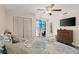 The bedroom is nicely sized with a closet and slider to the outdoors at 20191 Rutherford Ave, Port Charlotte, FL 33952
