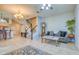 Bright living room boasts tile flooring, modern furnishings and staircase to the upper level at 2982 Estancia Pl, Clearwater, FL 33761