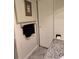Bathroom featuring tile floors, tile walls, and a granite countertop at 3301 Alt 19 # 700, Palm Harbor, FL 34683