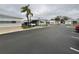 Charming mobile homes community with palm trees and well-maintained landscaping at 3301 Alt 19 # 700, Palm Harbor, FL 34683