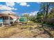 Backyard featuring ample lawn and a charming patio area at 585 Sky Harbor Dr # 416, Clearwater, FL 33759